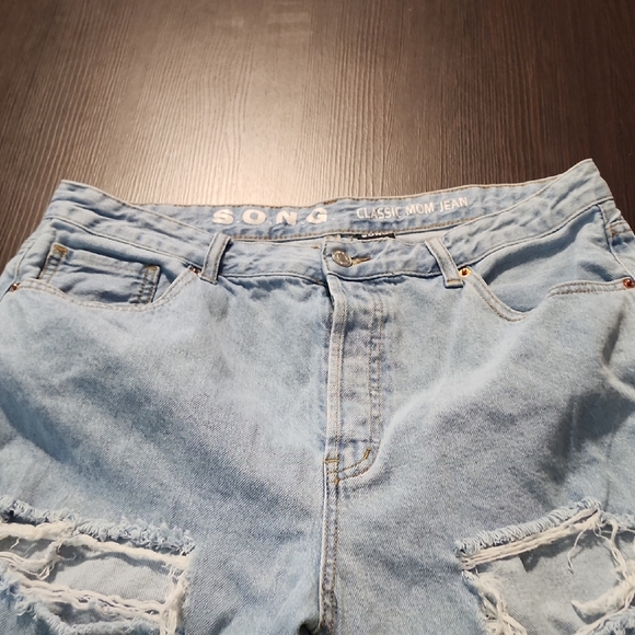 Distressed Light Blue Jeans - Picture 4 of 7